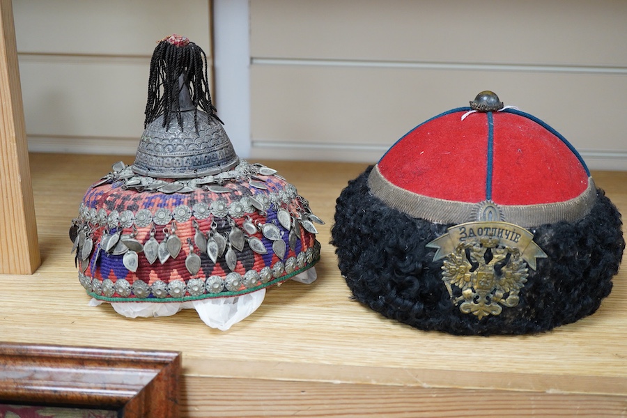An Imperial Russian 13th Erivan Grenadier Regiment Caucasian Corps Officer's Papakha - 19 cm high and an Afghan woman's skull cap (taqiyah). Condition - both good
